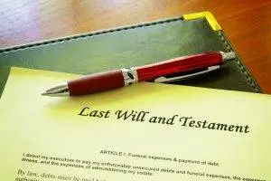 Conservatorship, Last Will and Testament with a pen on top of a green portfolio on a desktop Conservatorship, Signing a Will Under Conservatorship