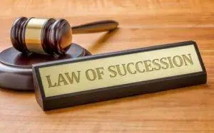 California Intestate Succession, Judges wood gavel and a name plate with Law of Succession California Intestate Succession