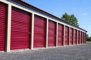 Sheriff Eviction, A row of mini rental storage units with burgundy metal doors. Sheriff Eviction, Storing an evicted tenants personal property following an eviction in California
