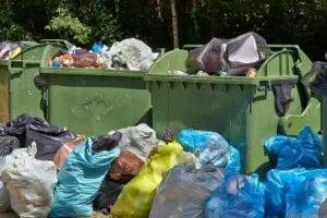 Sheriff Eviction, several bins filled with bags of trash Sheriff Eviction,