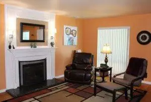 Cory neighborhood home, Living room with gas burning insert Cory neighborhood home,