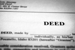 An experienced probate realtor checks title to the property